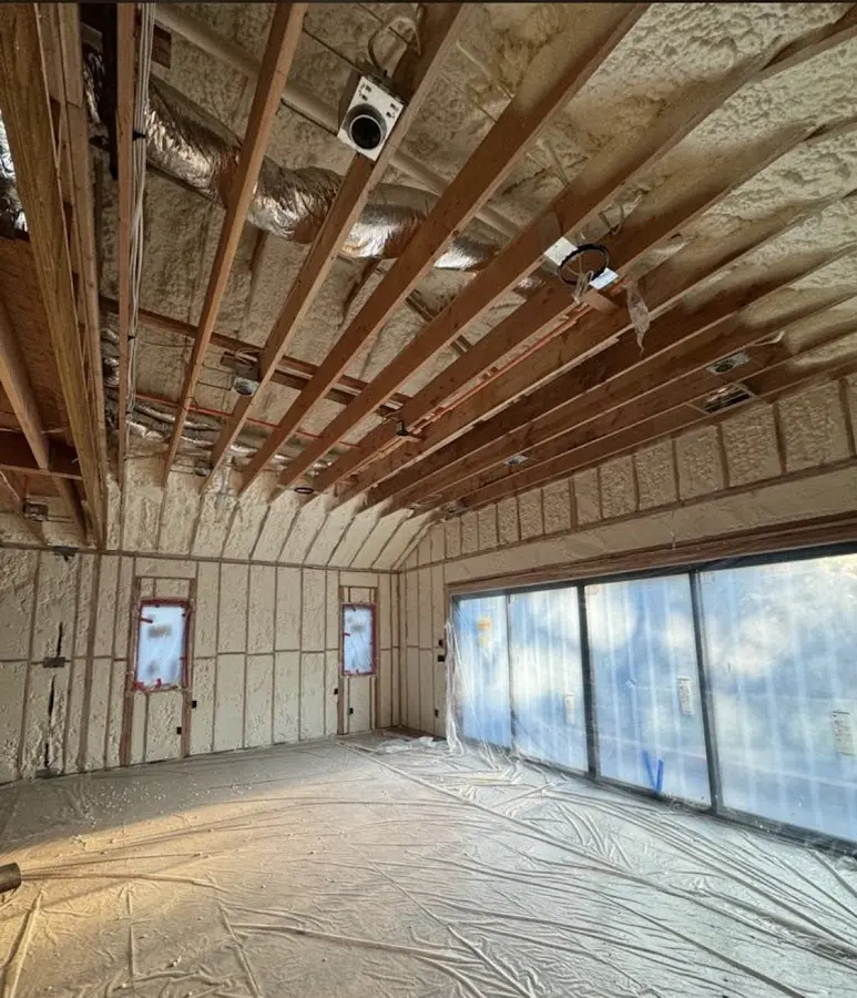 Interior walls and ceiling insulated with spray foam during new construction in Lakewood Park